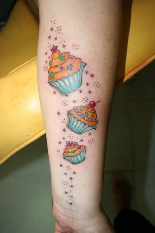 Color Cupcake Tattoos On Left Forearm