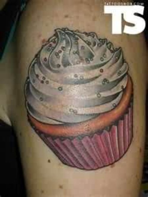 Cupcake Tattoo On Girl Left Shoulder