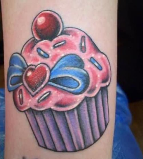 Blue Ink Bow and Cupcake Tattoo