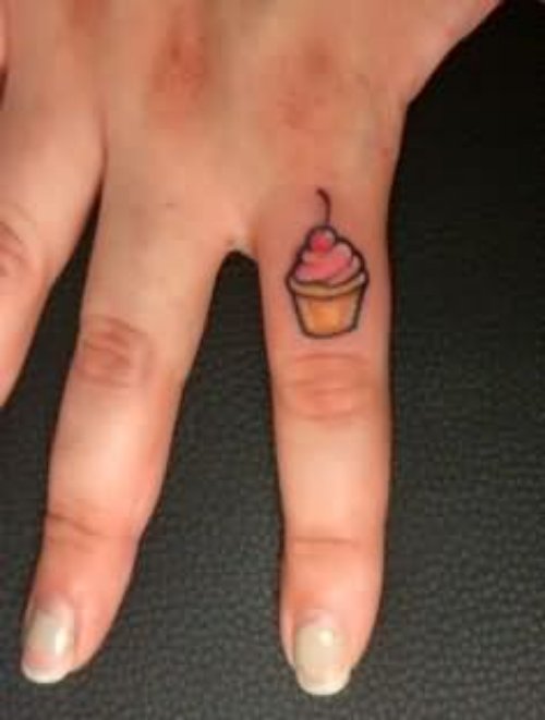 Cupcake Tattoo On Left Finger