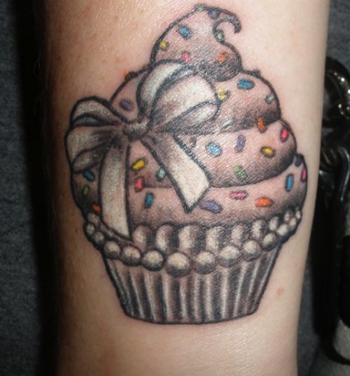 Grey Ink Cupcake Tattoo On Sleeve