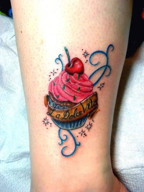 Color ink Banner And Cupcake Tattoo On Sleeve