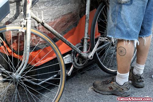 Cycle Wheel Tattoo On Leg