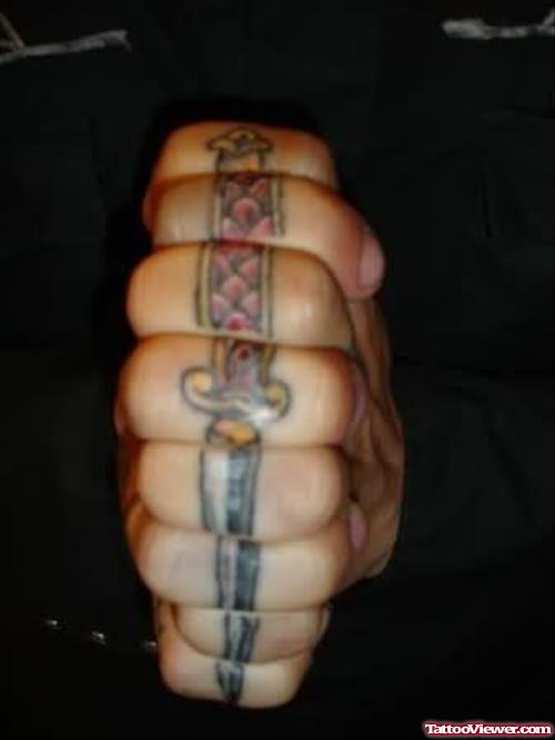 Dagger Tattoo On Fingers.