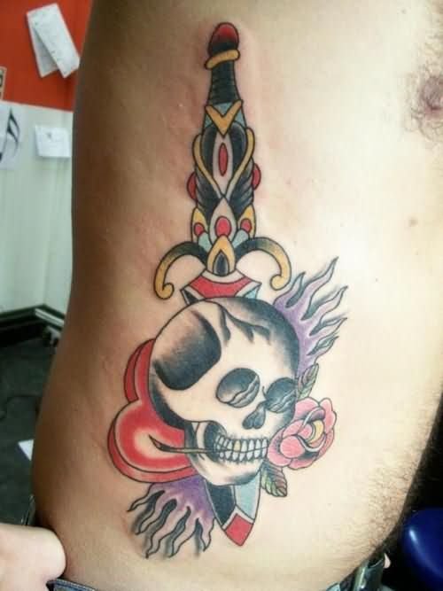 Man Rib Side Skull And Dagger Tattoo