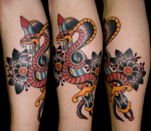 Black Flower and Snake With Dagger Tattoo On Leg