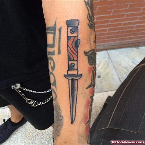 dagger on arm tattoo