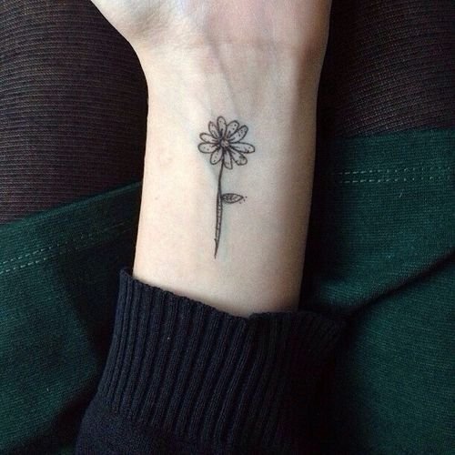 Simple Daisy Tattoo On Left Wrist