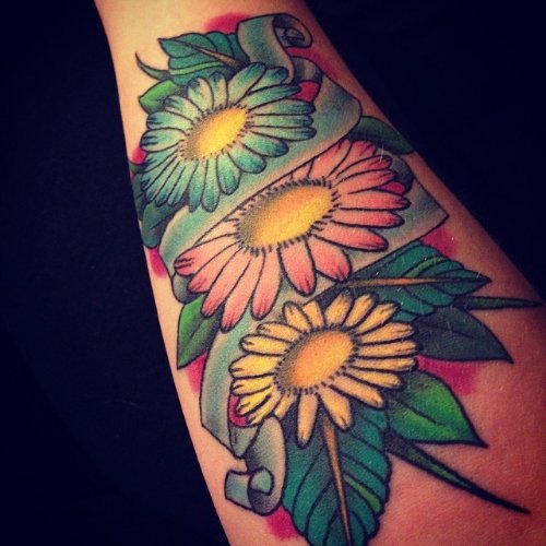 Colored Daisy Flowers Tattoos On Forearm
