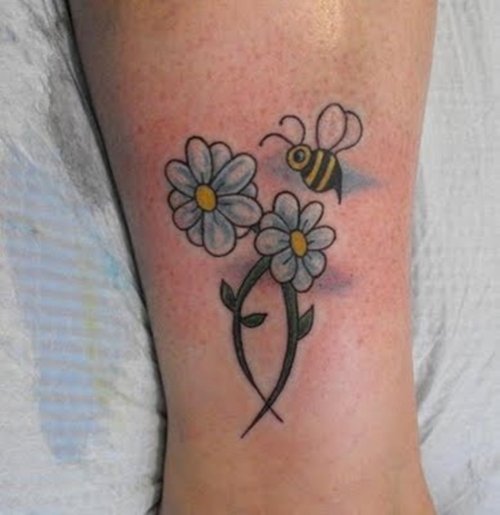 Bumblebee And Blue Daisy Flowers Tattoo On Leg