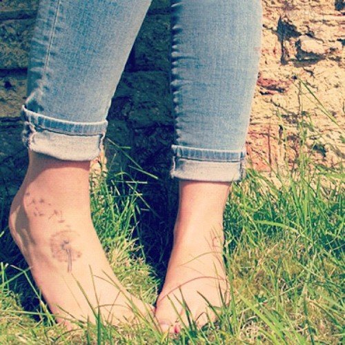 Dandelion Puff Tattoo On Girl Foot