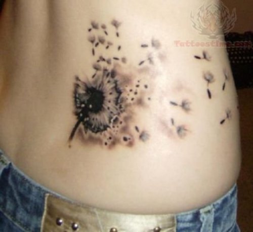 Dandelion Blowing Flower Tattoo On Back