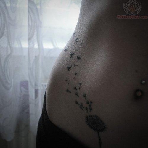 Dandelion Hip Tattoo And Belly Piercing