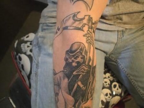 Scary Death Tattoo On Elbow