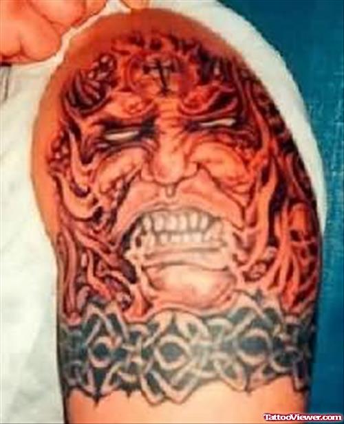 Demon Tattoo On Upper Shoulder