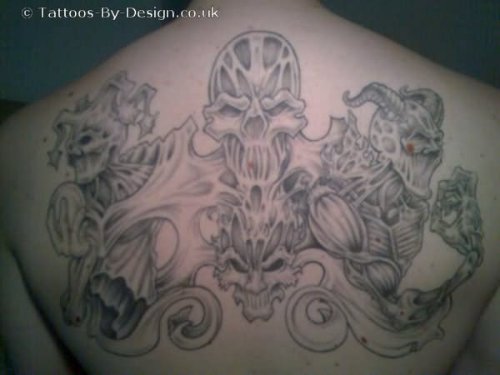Grey Demon And Devil Jester Tattoo On Back
