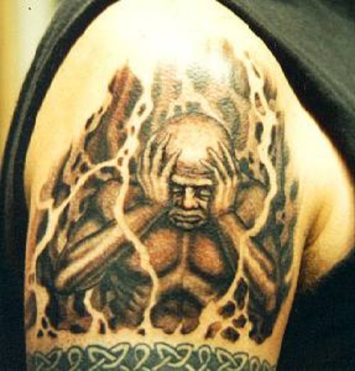 Sad Demon Tattoo On Shoulder