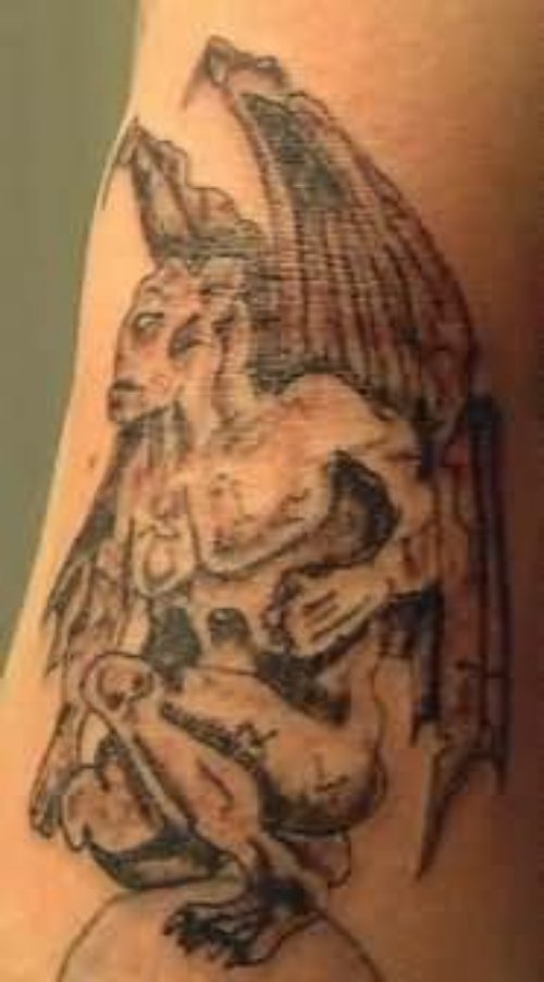 Grey Ink Demon Tattoo On Sleeve