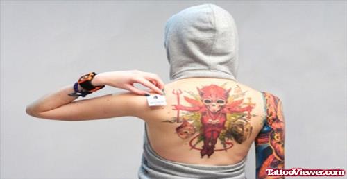 Red Ink Devil Tattoo On Girl Back