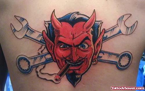 Devil Face With Tools Tattoo On Back
