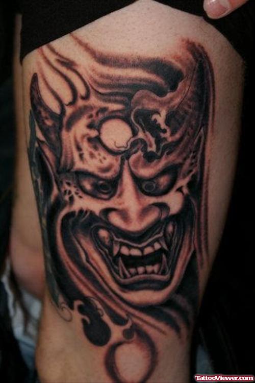 Grey Ink Devil Tattoo On Thigh