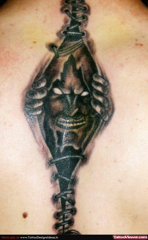 Ripped Skin Devil Tattoo On Back Body