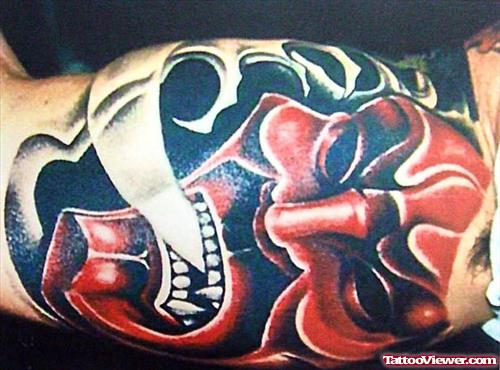 Red Ink Devil Head Tattoo On Half Sleeve