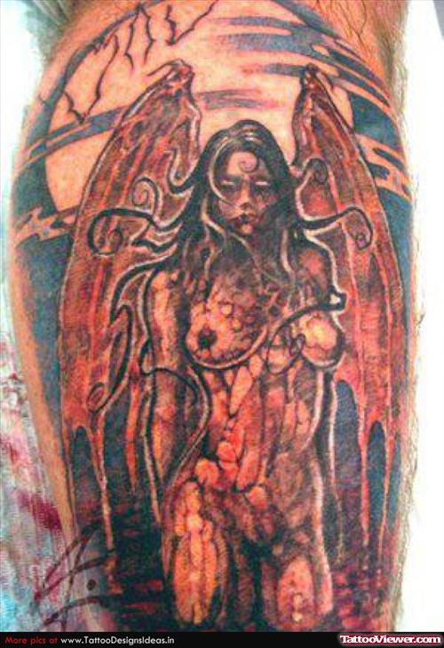 Red Ink Devil Girl Tattoo On Back Leg