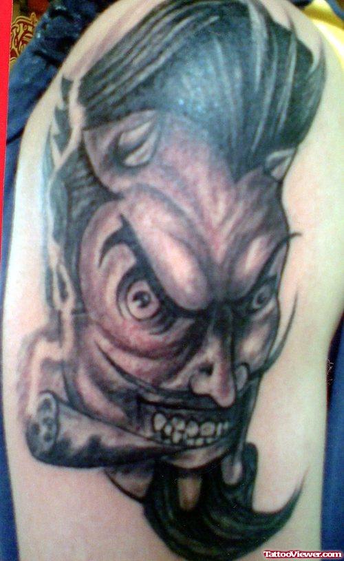 Grey Ink Devil Tattoo On Right Sleeve