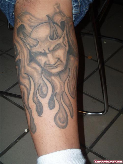 Grey Ink Devil Tattoo Design On Leg