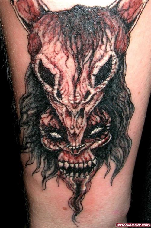 Goat Skull And Devil Skull Tattoo