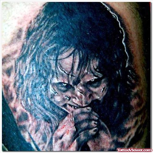 Evil Scary Tattoo On Bicep
