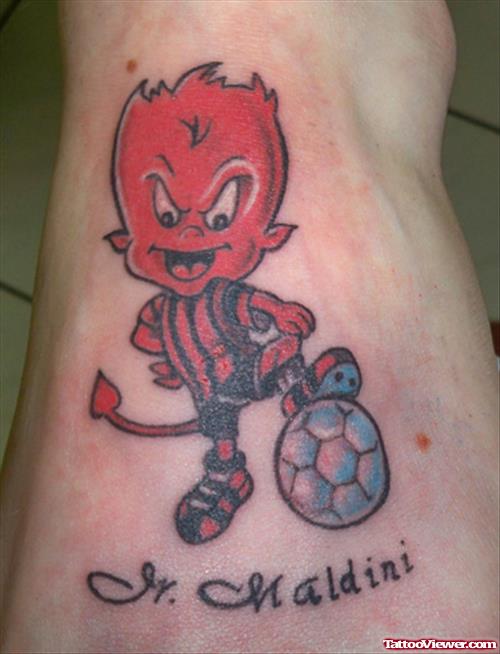 Cute Devil With Football Tattoo Design On Foot