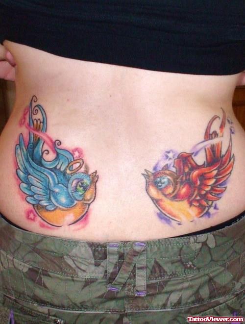 Colored Angel And Devil Birds Tattoos On Lowerback