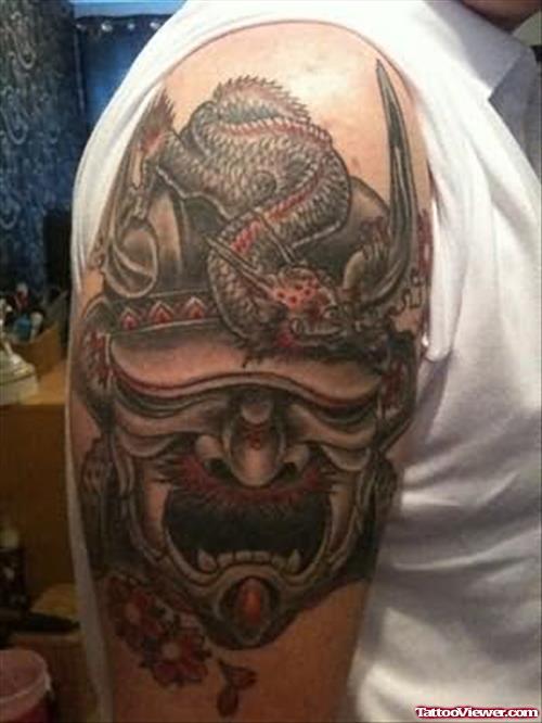 Devil Mask Tattoo On Shoulder