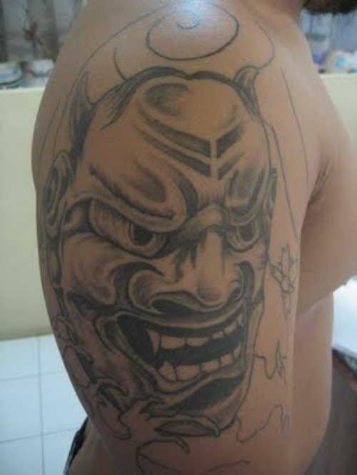 Grey Ink Devil Head Tattoo On Man Right Half Sleeve