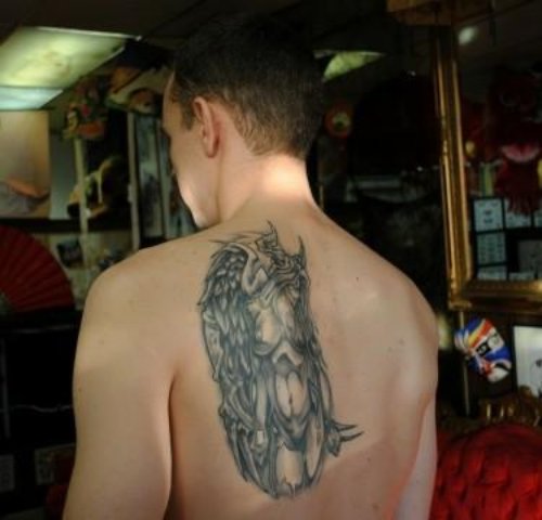 Attractive Grey Ink Devil Tattoo On Man Back Body