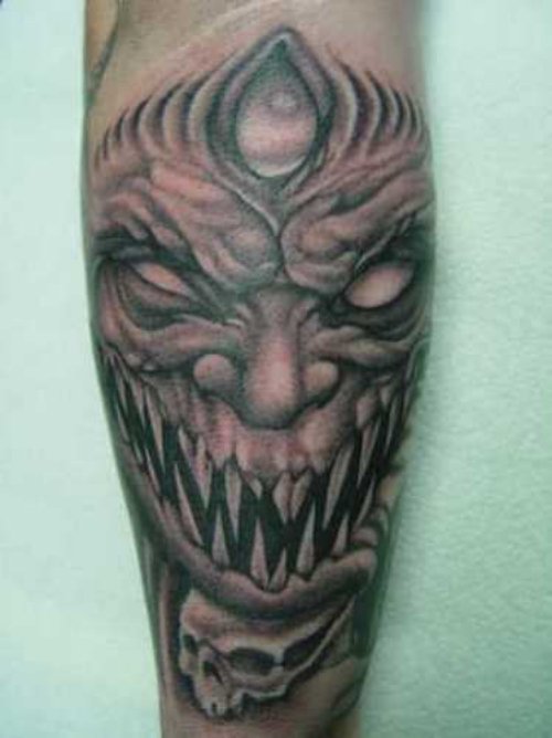 Grey Ink Devil Head Tattoo