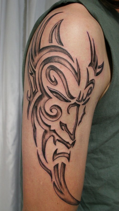 Tribal Devil Head Tattoo On Right Half Sleeve