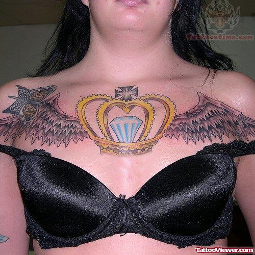 Crown And Diamond Tattoo On Chest
