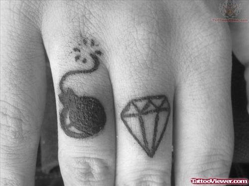 Diamond And Bomb Tattoo On fingers