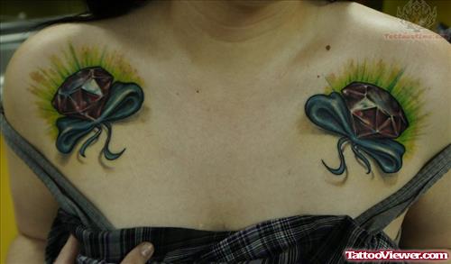 Bow And Diamond Tattoo On Chest
