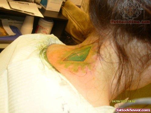 Green ink Diamond Tattoo On Back Neck