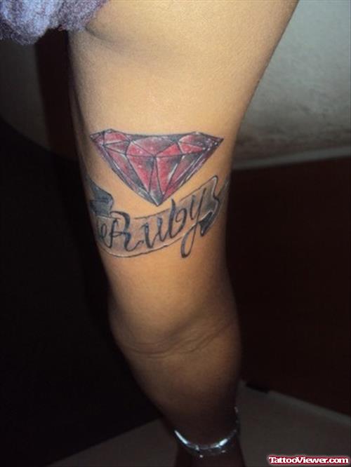 Ruby Diamond Tattoo On Arm