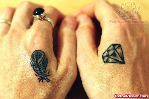 Feather And Diamond Tattoo On Hand