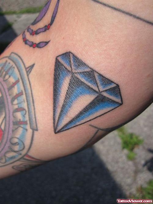 Black And Blue Ink Diamond Tattoo