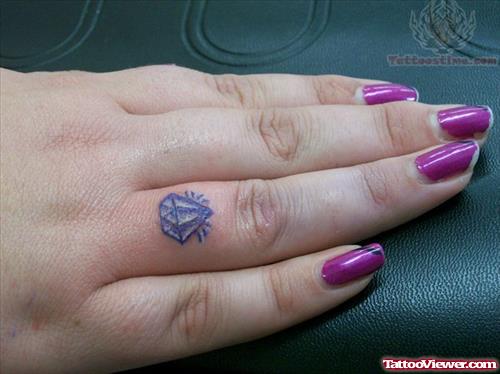 Purple Diamond Tattoo On Finger