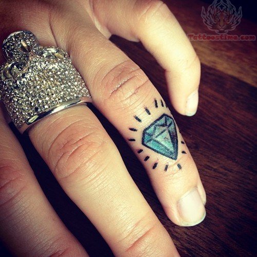 Charming Blue Diamond Tattoo On Finger