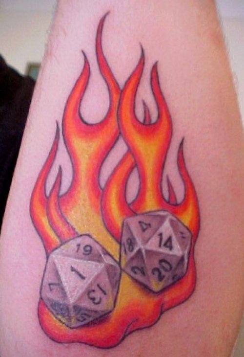 Flaming Dice Tattoo On Arm