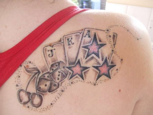 Stars And Dice Tattoos On Right Back Shoulder